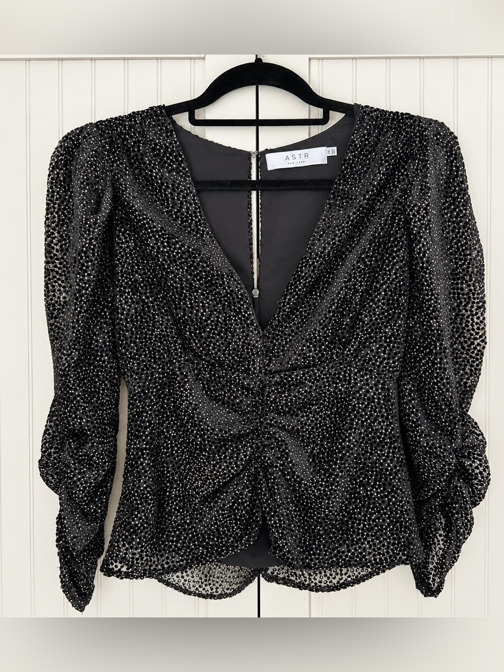Astr Black dotted V-Neck Ruched Blouse